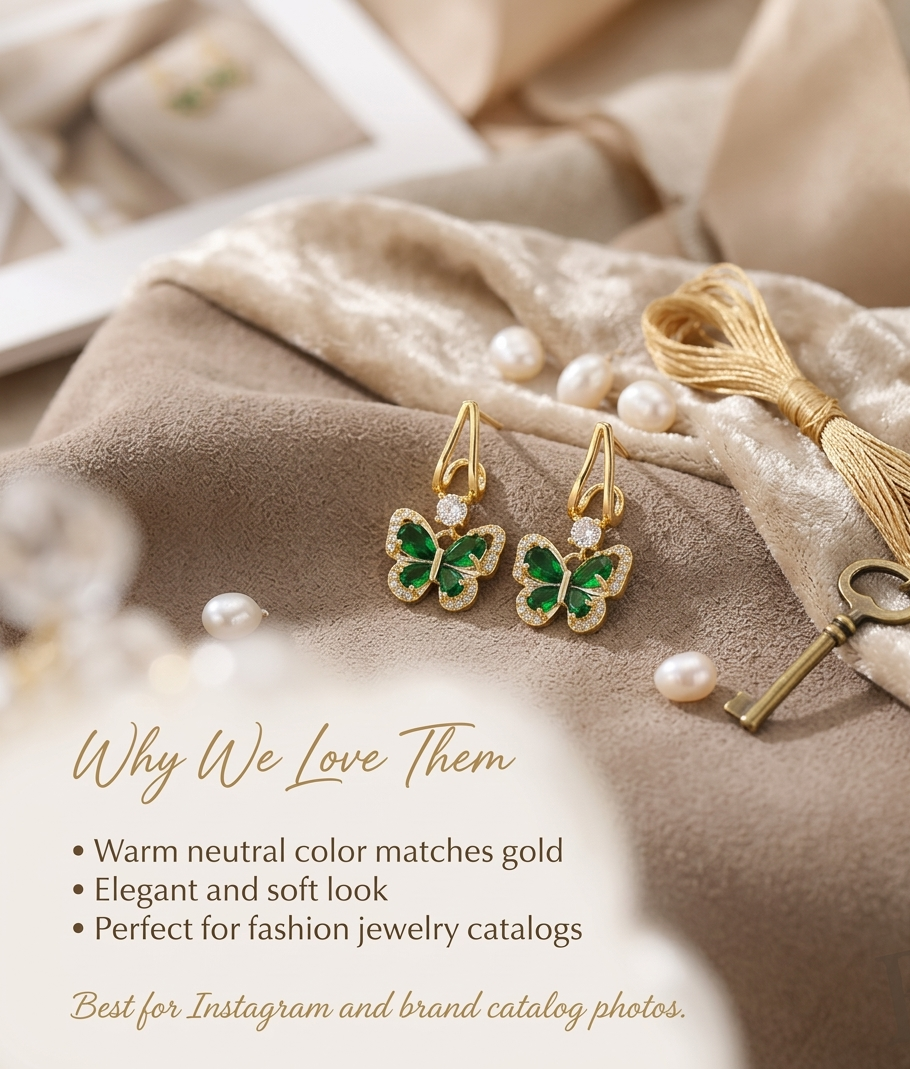 Elegant Gold Butterfly Earrings with Emerald Green Stones